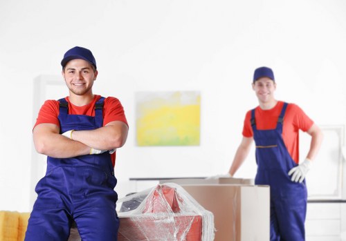 House removal team planning a move in White City near apartment blocks