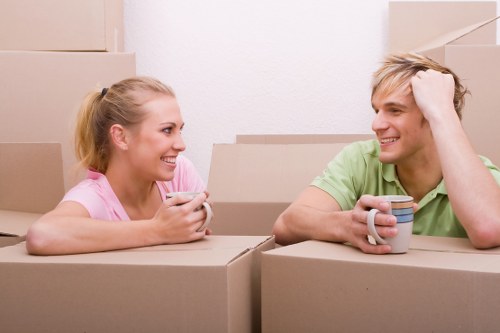Careful wrapping of fragile household items before moving