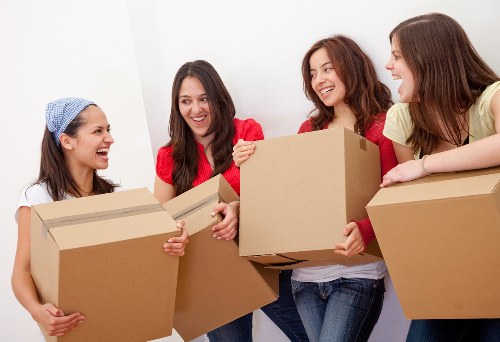 Loading and unloading items during a removals service in White City