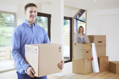 Packed moving boxes ready for transport in a White City home