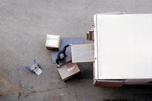 Movers planning a local home move in White City with residential buildings nearby