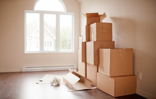 Local team loading bulky furniture for pick-up