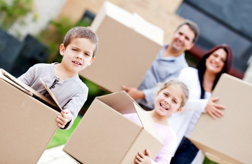 Packed household items prepared for a removal truck move in White City