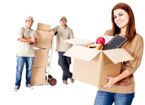 Helper moving boxes for a White City delivery