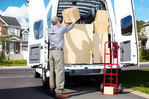 Professional movers handling access and loading for a White City business move