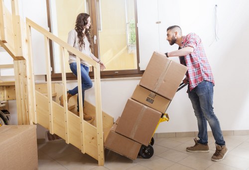 Packed boxes and furniture ready for a local White City home move